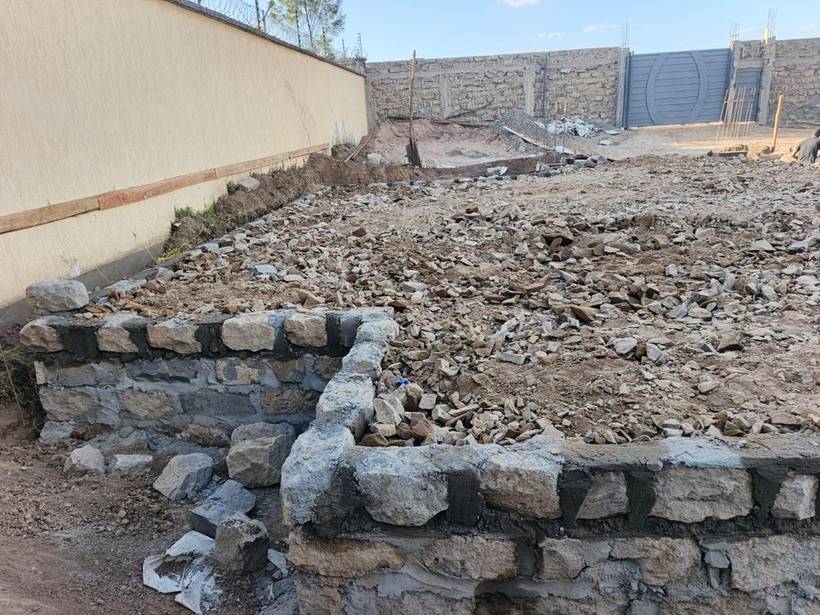 Boundary wall foundation set out along the plot edge